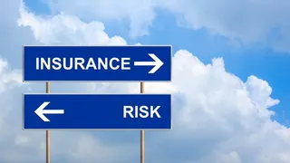Low interest rates squeeze income, raise insolvency risk for re/insurers